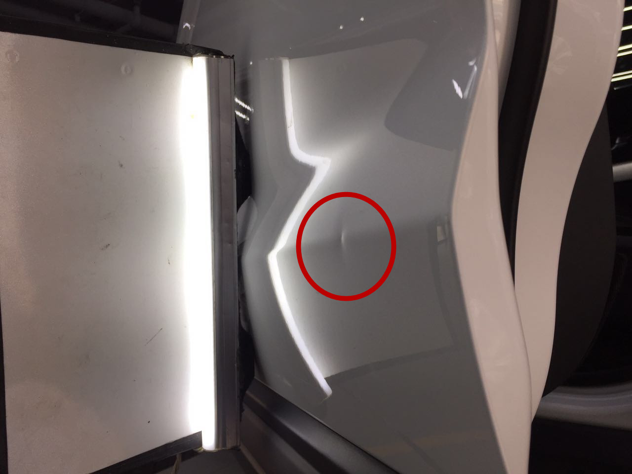 路虎极光修凹陷掉漆,新款路虎极光车门凹陷修复