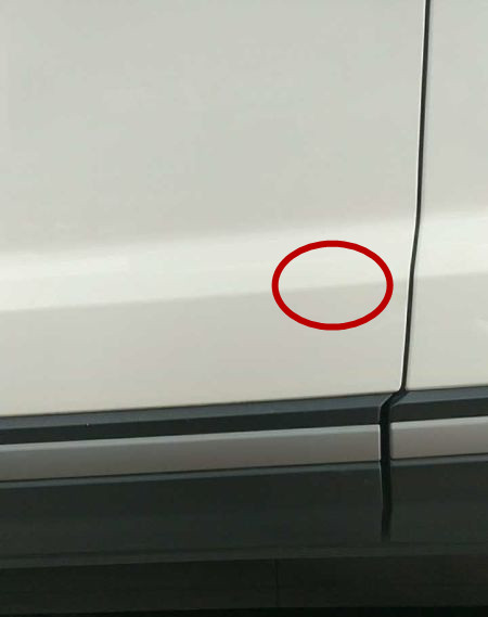 现场实拍：路虎极光车门小坑怎么修不伤原车漆