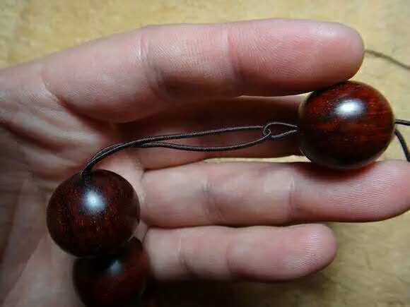 紫檀佛塔打结,小叶紫檀手串侧挂佛头打结方法