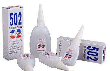 乒乓球拍胶皮不小心粘了502怎么办,乒乓球拍能粘两层套胶吗