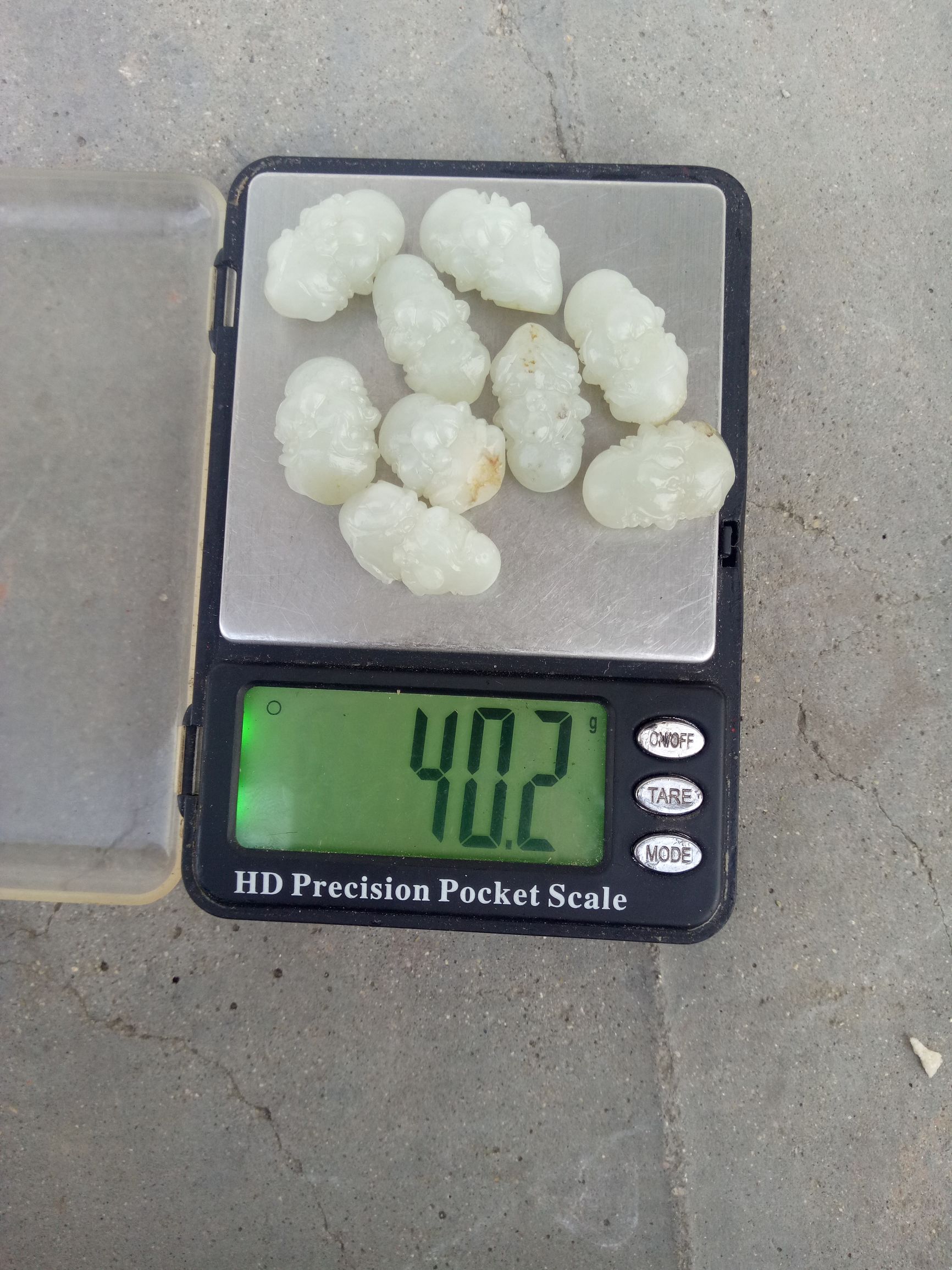 巴掌大的玉矿石值多少钱,巴掌大的玛瑙原石能卖多少钱