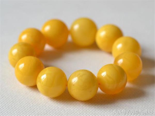 鸡油黄蜜蜡好还是鸡油红的蜜蜡好,鸡油黄蜜蜡盘玩后会变成鸡油红吗