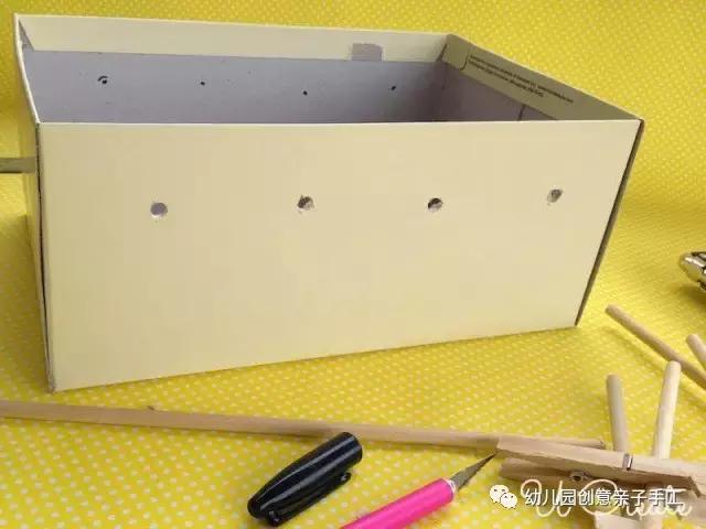 幼儿园纸盒足球手工,幼儿园益智手工盒子踢足球