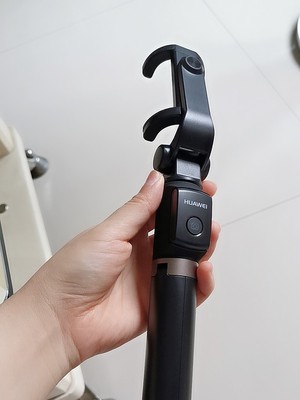 华为三脚架自拍杆af15怎么用,华为有线自拍杆的使用方法及操作