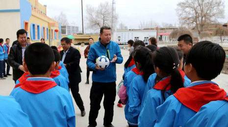 *疆新**红石慈善基金会亚力坤·奥斯曼专项基金的苹果足球之路