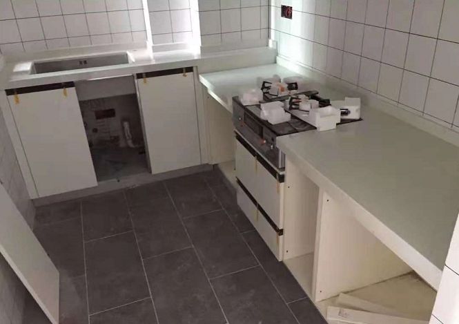 人造石橱柜好还是不锈钢橱柜好,灶台是不锈钢好还是人造石好