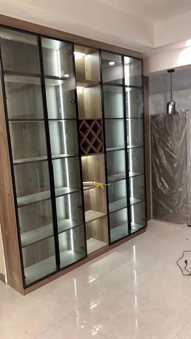 钛晶玻璃门板怎么样,钛晶玻璃门装修效果图