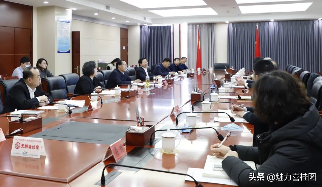 高闻何李新春会见江苏新誉集团董事长周立成一行