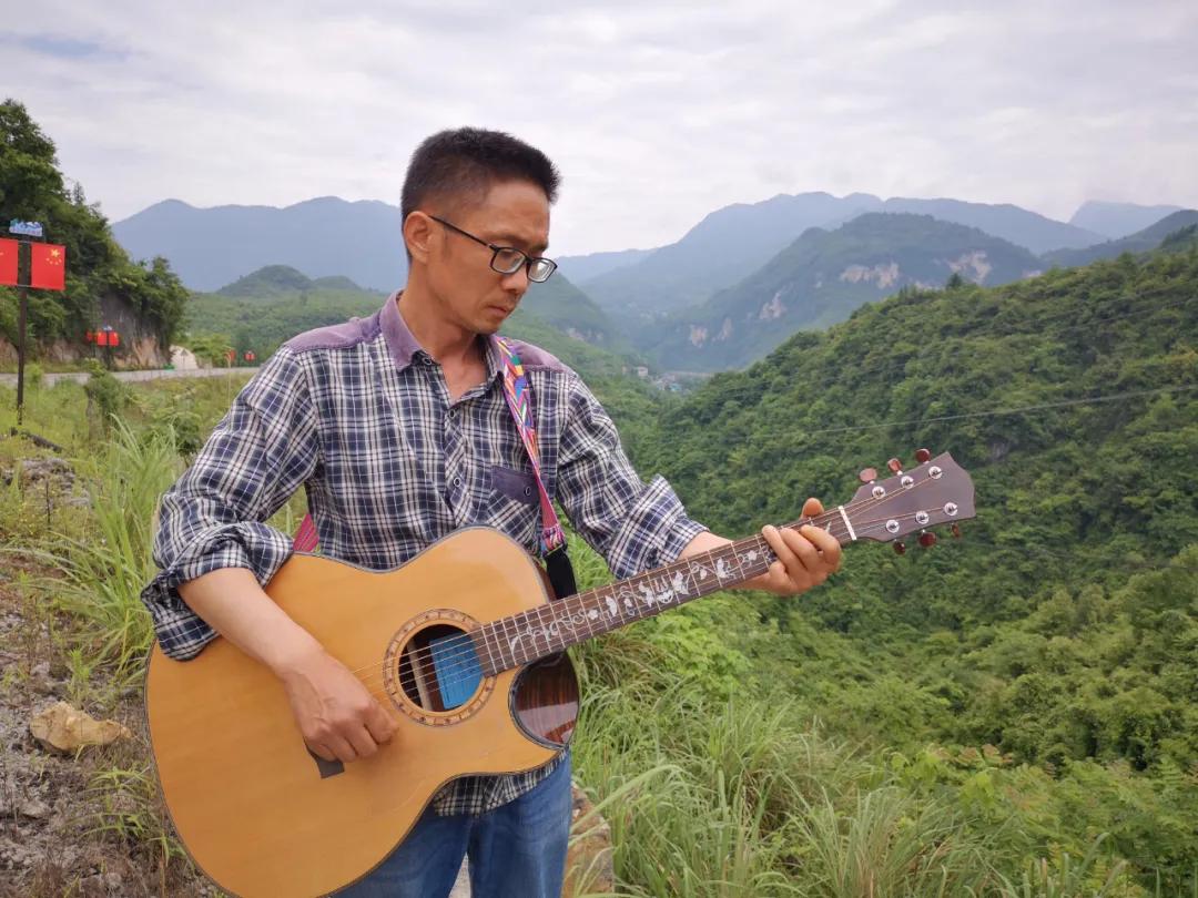 张家界吉他手工制作,张家界手工吉他