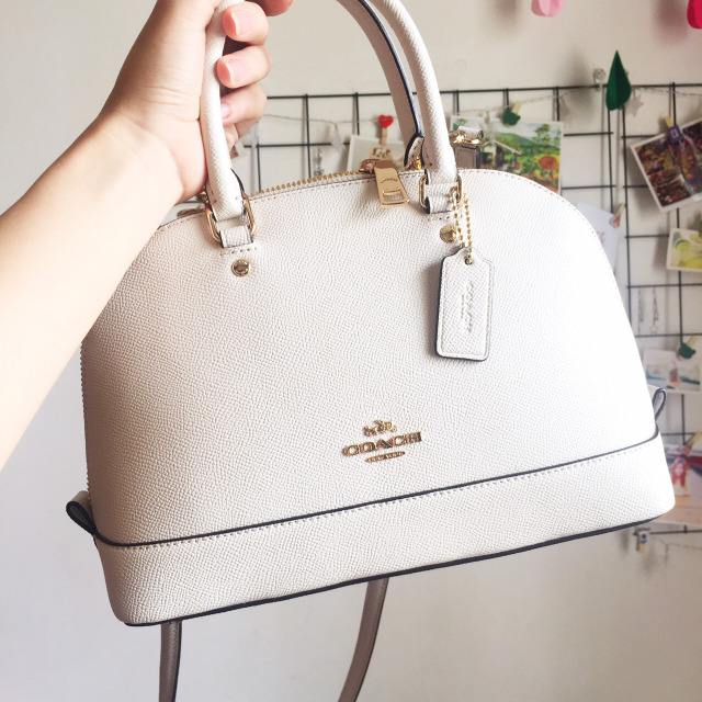 coachgeorgie马鞍包专柜与奥莱区别,coachhutton专柜款和奥莱款的区别