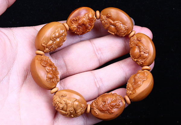 橄榄手串盘花,橄榄核雕手串盘花了怎么办视频