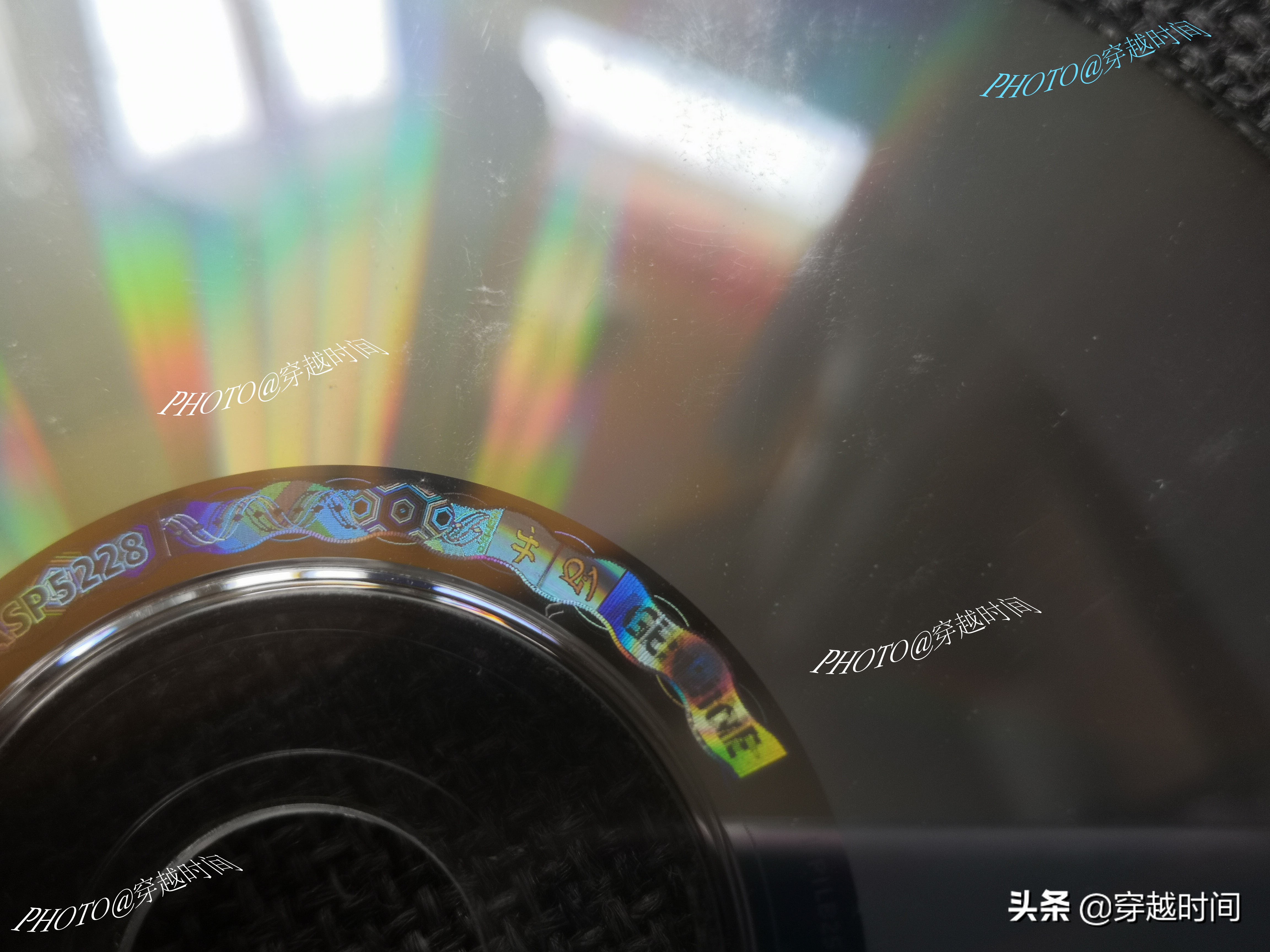 「百年光磁」全息防伪的WindowsXP光盘啥样?缤纷绚丽千变万化