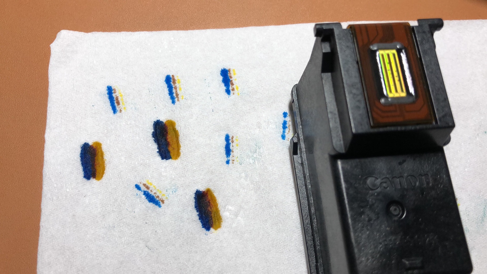 打印机彩色墨盒喷头漏墨,喷墨打印机外置墨盒断墨怎么处理