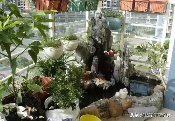 阳台角落鱼池假山流水景观制作,庭院假山鱼池景观设计效果图