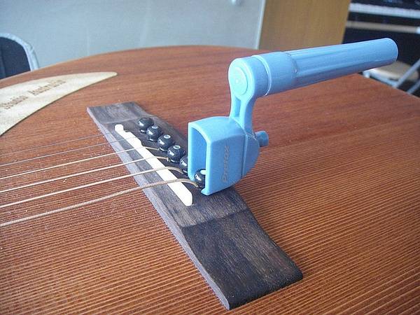 怎样调节吉他的手感至最佳状态