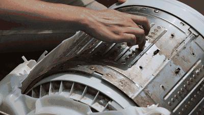 洗衣机加水有臭味怎么办,洗衣机污垢和霉菌