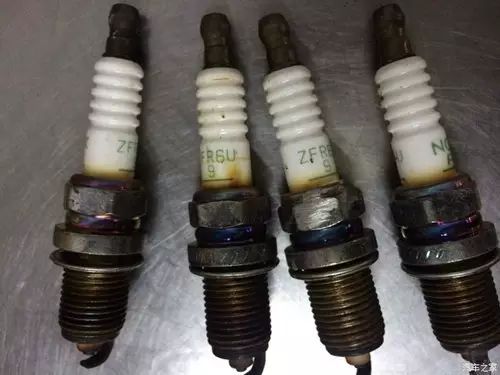 火花塞陶瓷变黄怎么回事,火花塞陶瓷部位变黑是什么原因