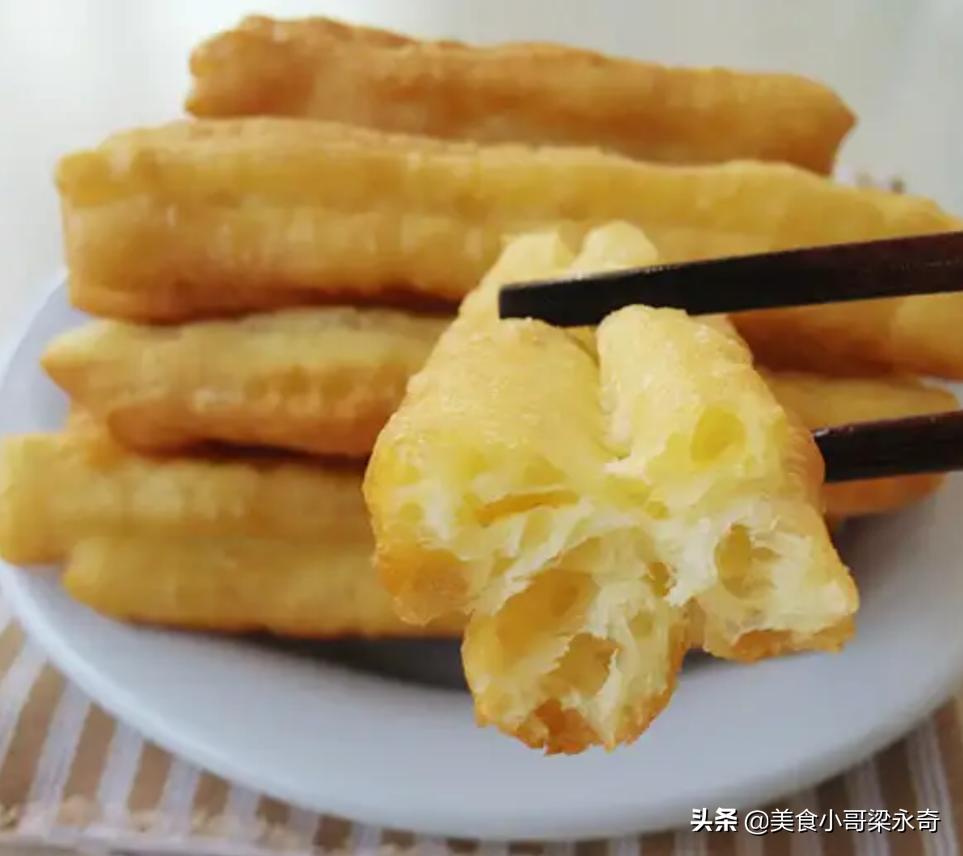 油条膨松剂怎样炸出蓬松的油条,怎么才能让油条炸得蓬松