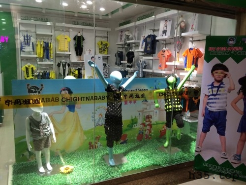 最新童装店双门头装修效果图,童装店怎么装修才有顾客