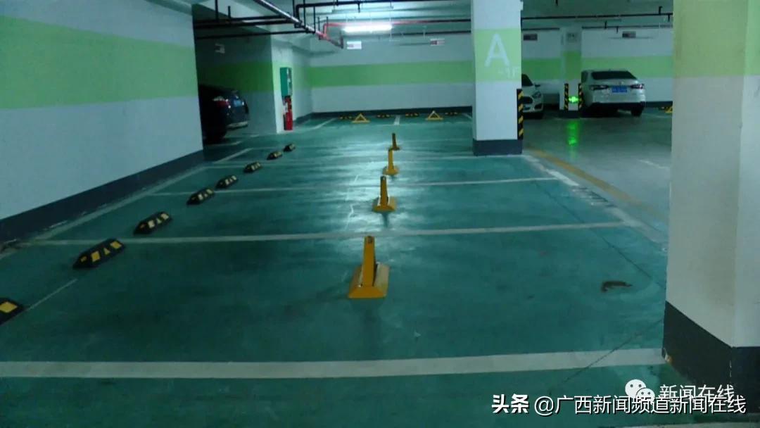 南宁各小区地下停车场,南宁一小区停车位装上隔离栏