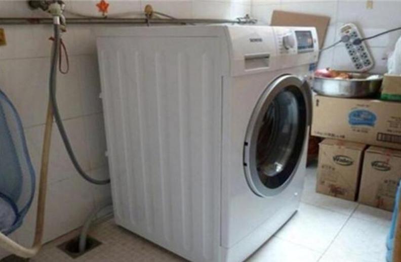 阳台洗衣机下水返水,怎么解决洗衣机下水往上返水