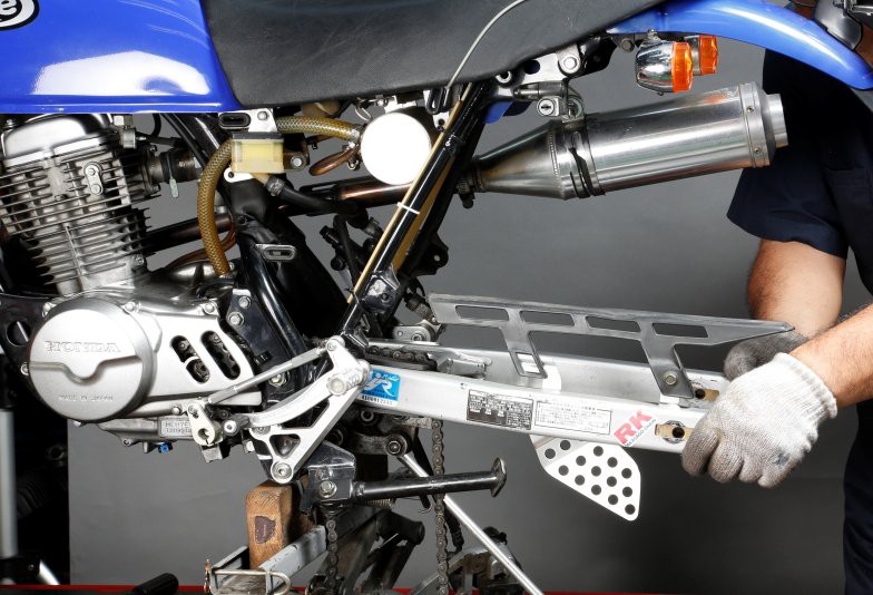 摩托车后避震软会怎样,踏板摩托车避震异响