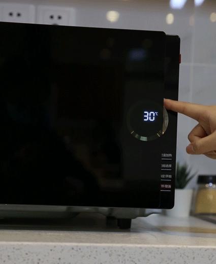 美的定温微波炉pc23c1w,美的定温微波炉的功能与用法