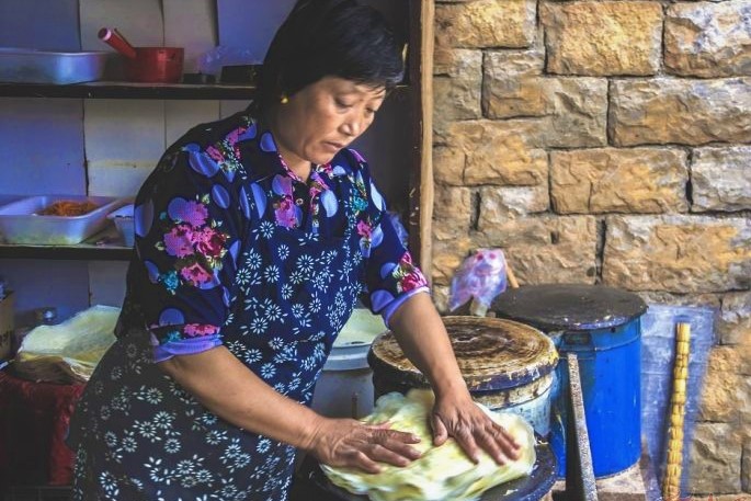 枣庄菜煎饼因什么而出名,枣庄菜煎饼起源于哪里