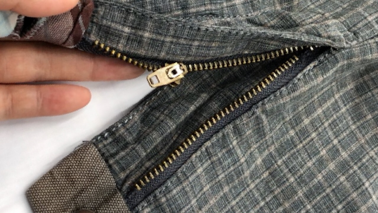 行李箱拉链一边脱落自己怎样修,拉链一边脱落了怎么修复