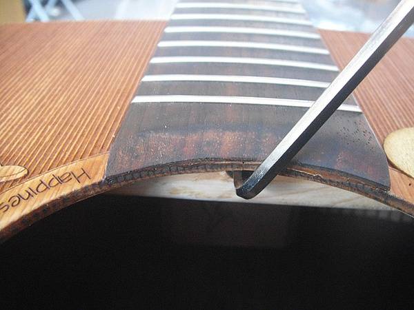 怎样调节吉他的手感至最佳状态