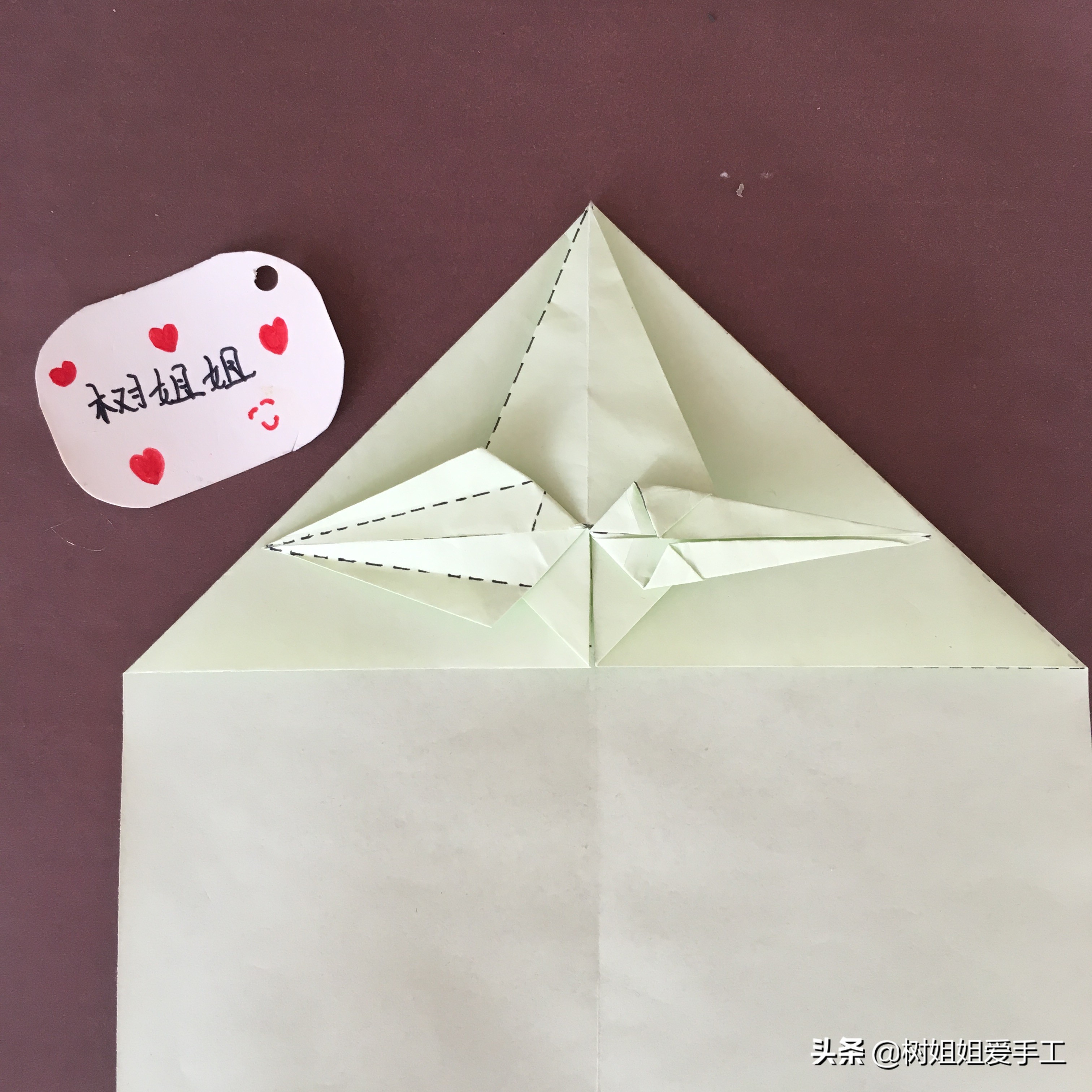 拖尾孔雀的三角插教程,折纸孔雀尾巴怎么折