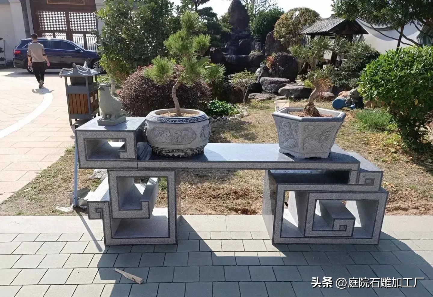 石雕花架庭院摆放效果图,庭院盆景老石板花架