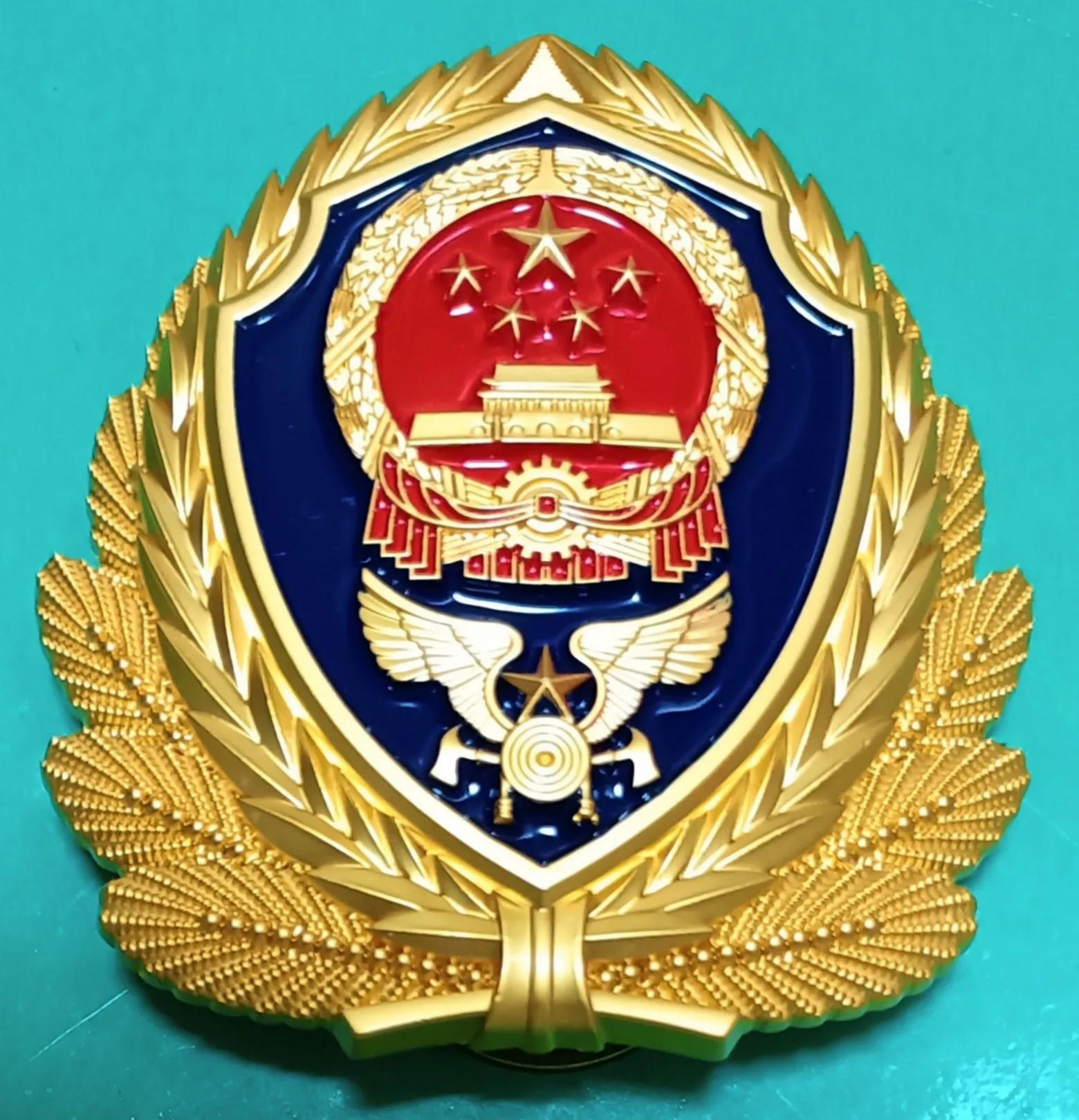 毛启国：*队军***警武**公安消防帽徽鉴赏