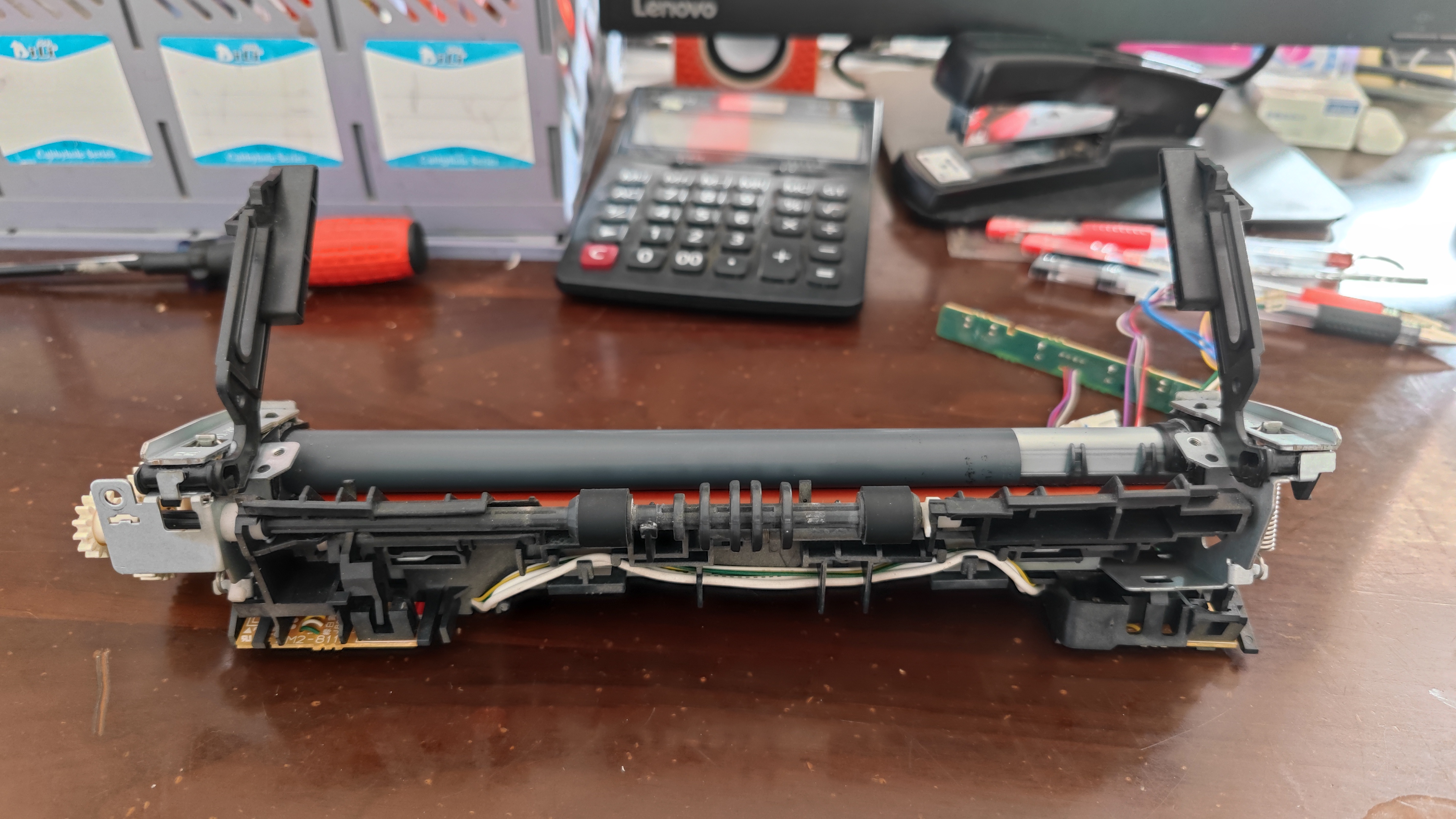 hp15w打印机怎么更换定影膜,hp126a打印机换定影膜