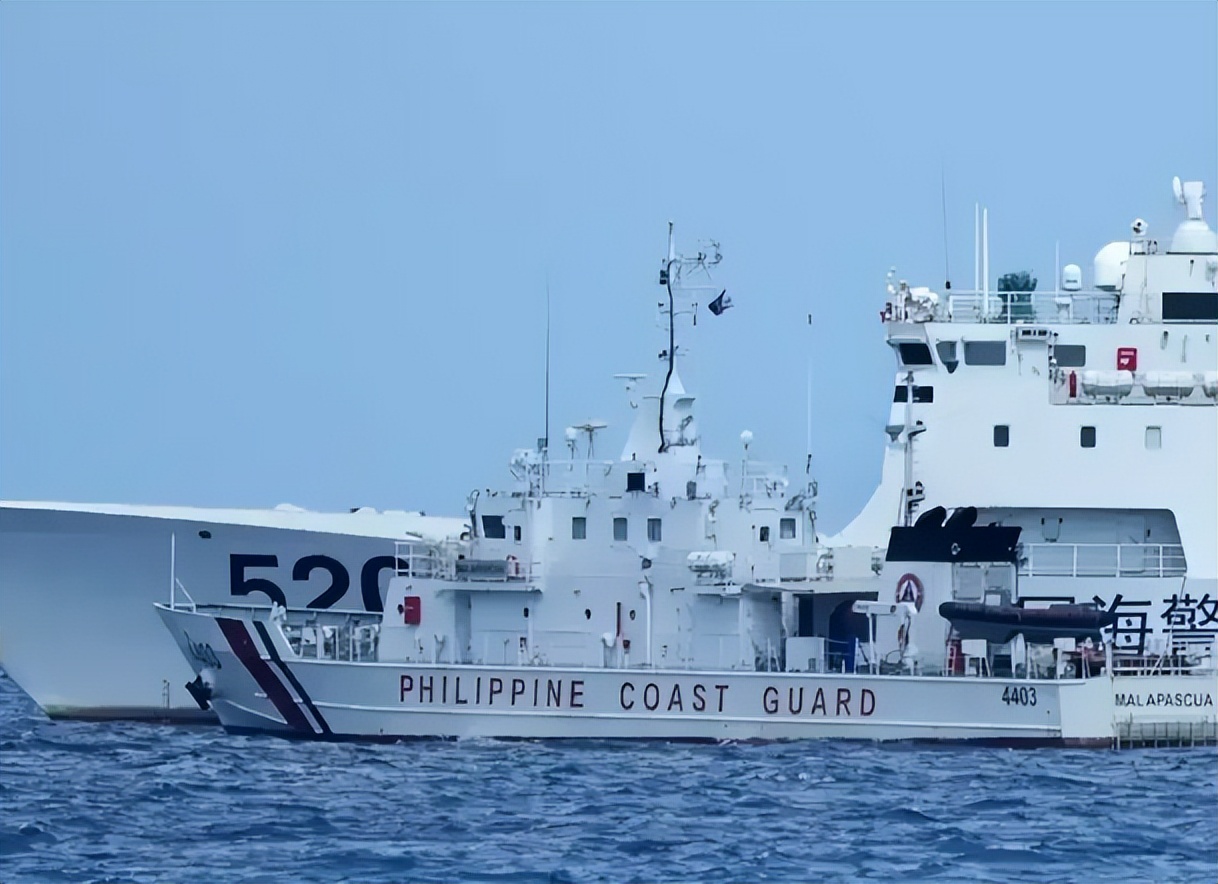 中菲南海舰船对峙情况,美两架军机出现在中国南海海域