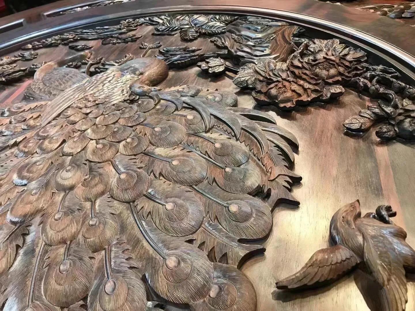 深雕圆餐桌图片大全,孔雀开屏奢石餐桌产地