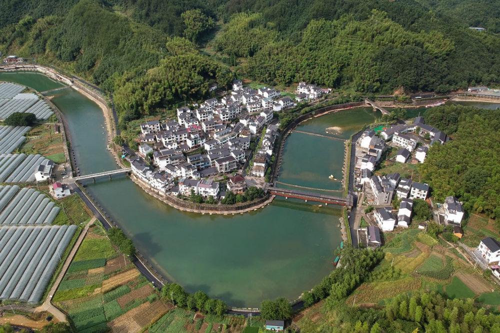 千万工程造就美丽乡村人民日报,千万工程塑造美丽乡村新华社