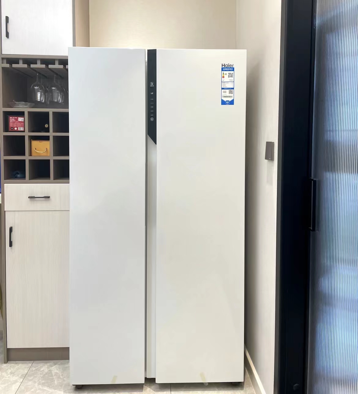 对开冰箱和十字门冰箱哪个更实用,海尔469升十字对开冰箱销量怎么样