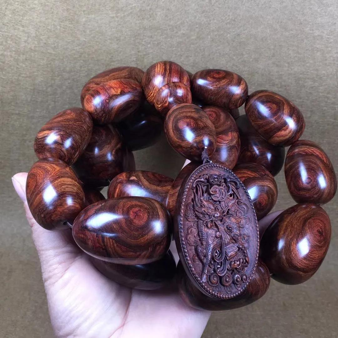 几百块一串的海南黄花梨手串,1.0的108串海南黄花梨手串配饰图片