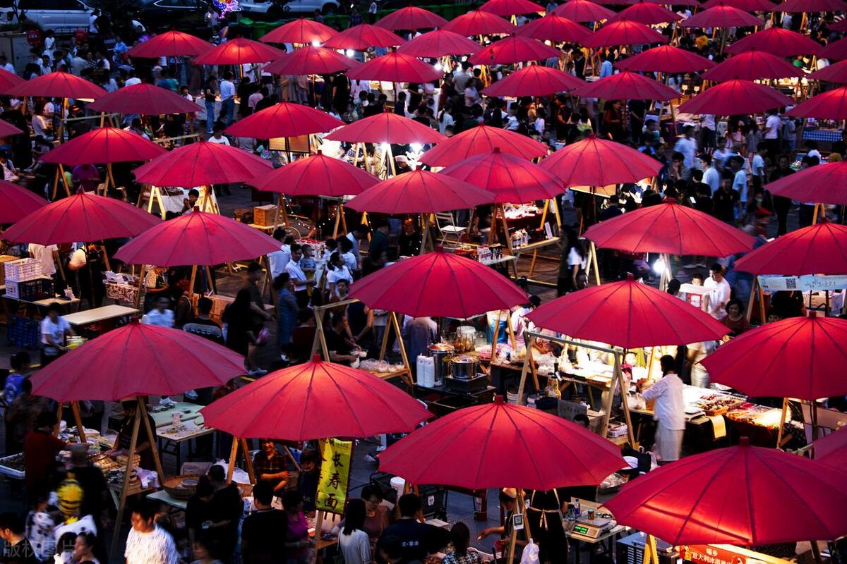 中国地摊经济促进就业,地摊经济带来的市场活力
