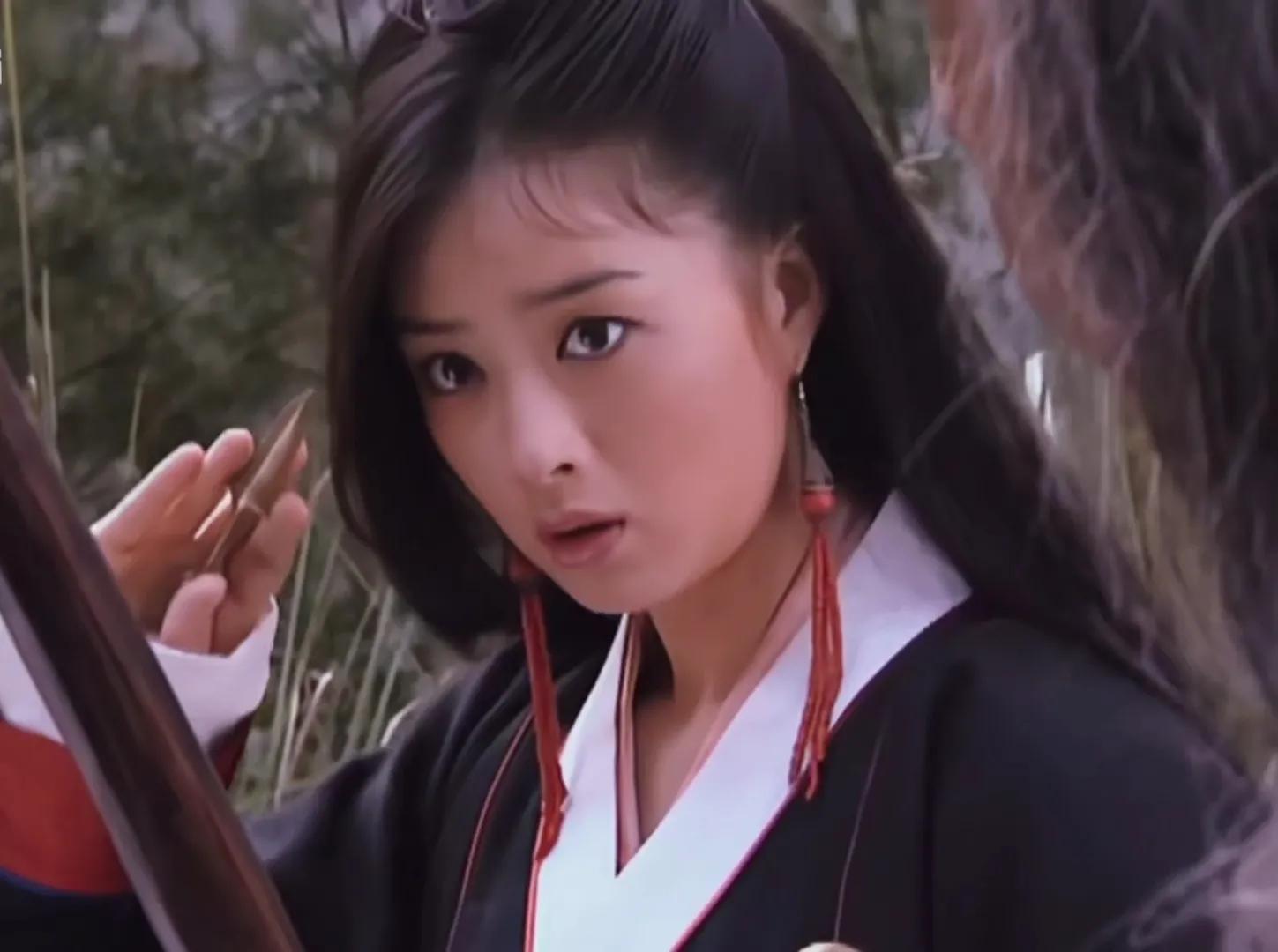 木婉清摘面纱,木婉清面纱被吹落的画面